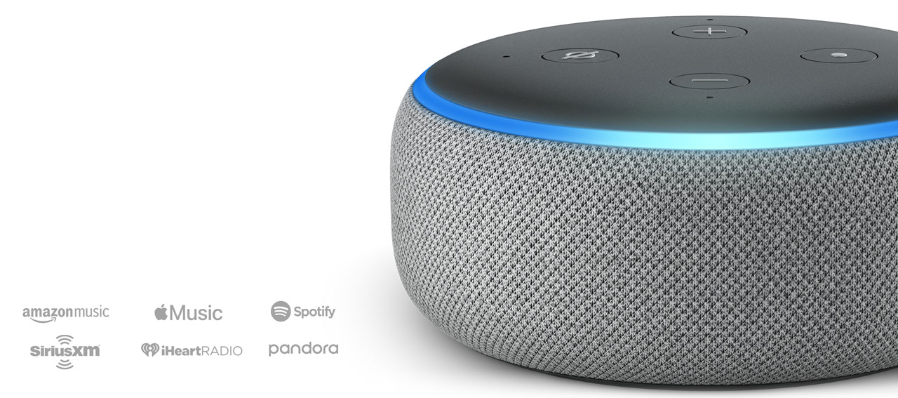   Front view of an Echo Dot, showing the fabric exterior and a blue LED ring, next to it to the left are some logos of music streaming services, including Amazon Music, Apple music, Spotify, and more.